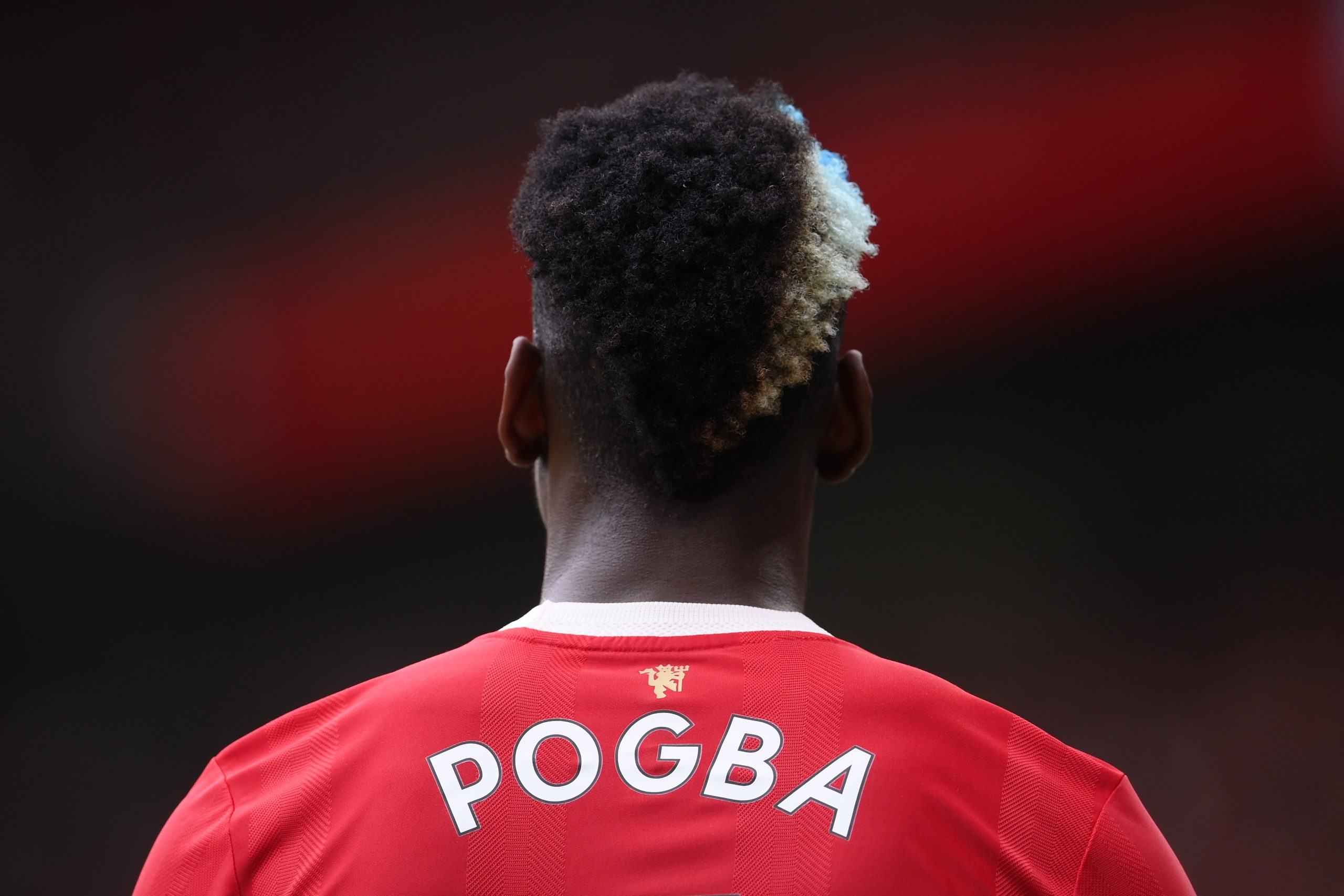MANCHESTER, ENGLAND - SEPTEMBER 25: A detailed view of the hair ofPaul Pogba of Manchester United during the Premier League match between Manchester United and Aston Villa at Old Trafford on September 25, 2021 in Manchester, England. (Photo by Laurence Griffiths/Getty Images)