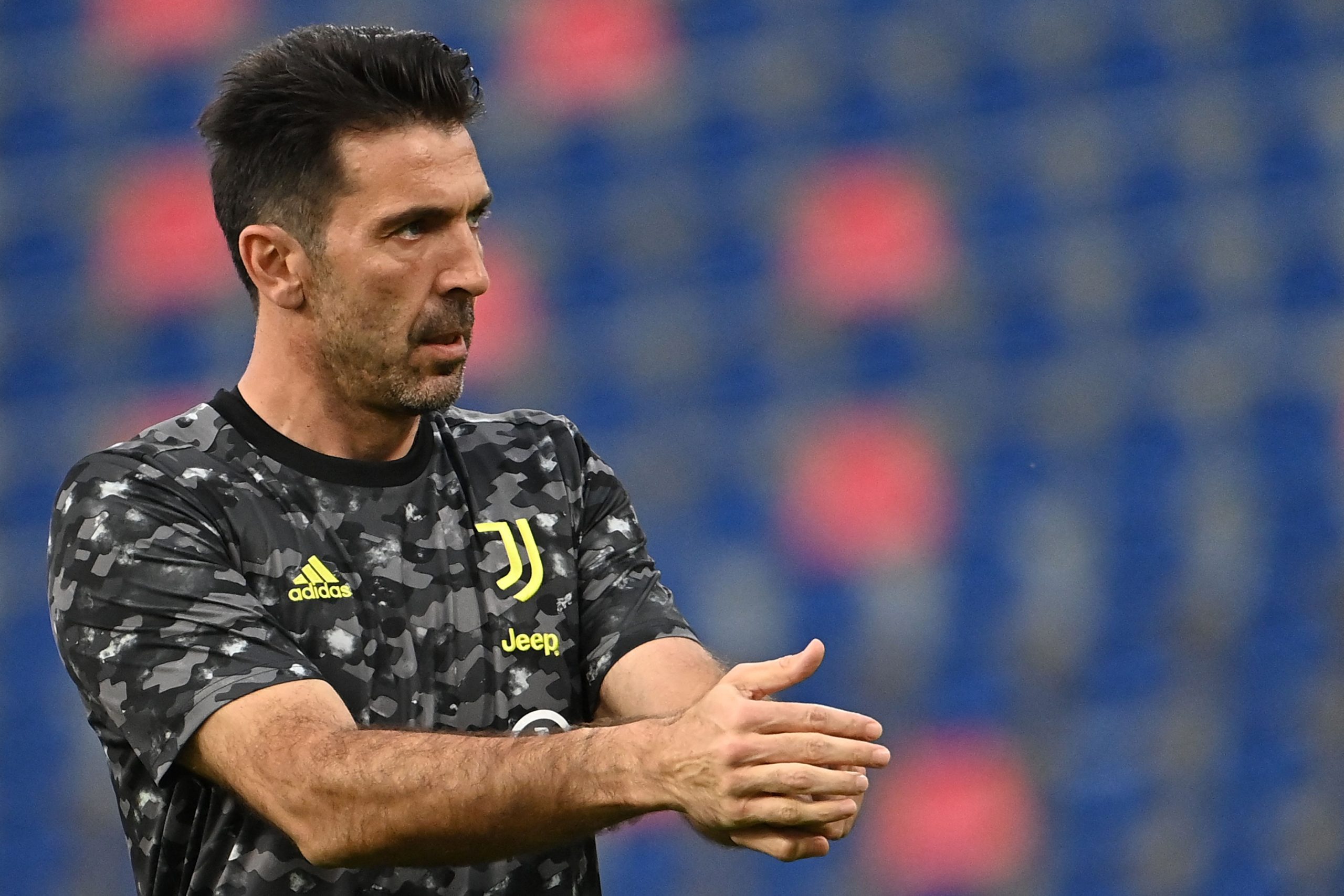 Juventus' Italian goalkeeper Gianluigi Buffon warms up prior to the Italian Serie A football match Bologna vs Juventus Turin on May 23, 2021 at the Renato-Dall'Ara stadium in Bologna. (Photo by ANDREAS SOLARO / AFP) (Photo by ANDREAS SOLARO/AFP via Getty Images)
