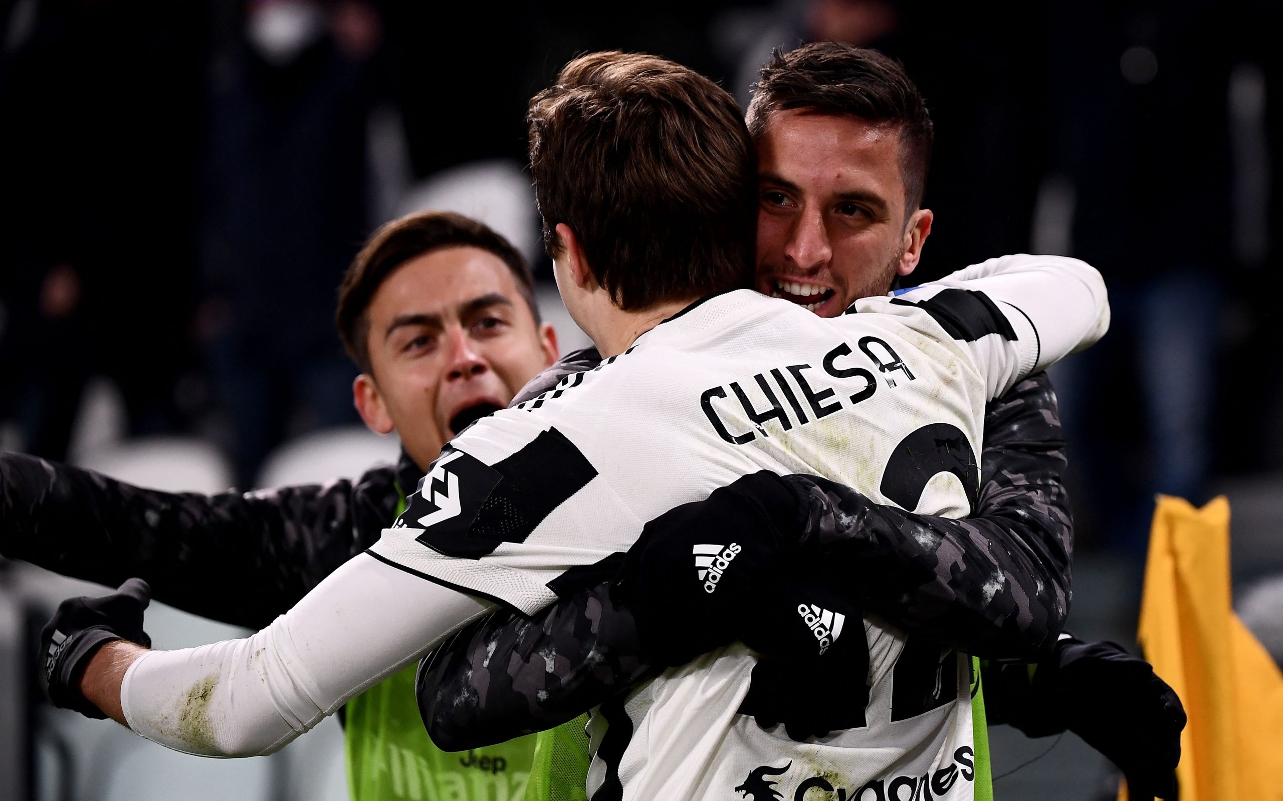 Juventus' Italian forward Federico Chiesa (C) celebrates scoring his team's first goal during the Italian Serie A football match between Juventus and Napoli at the Juventus stadium in Turin on January 6, 2022. (Photo by Marco BERTORELLO / AFP) (Photo by MARCO BERTORELLO/AFP via Getty Images)