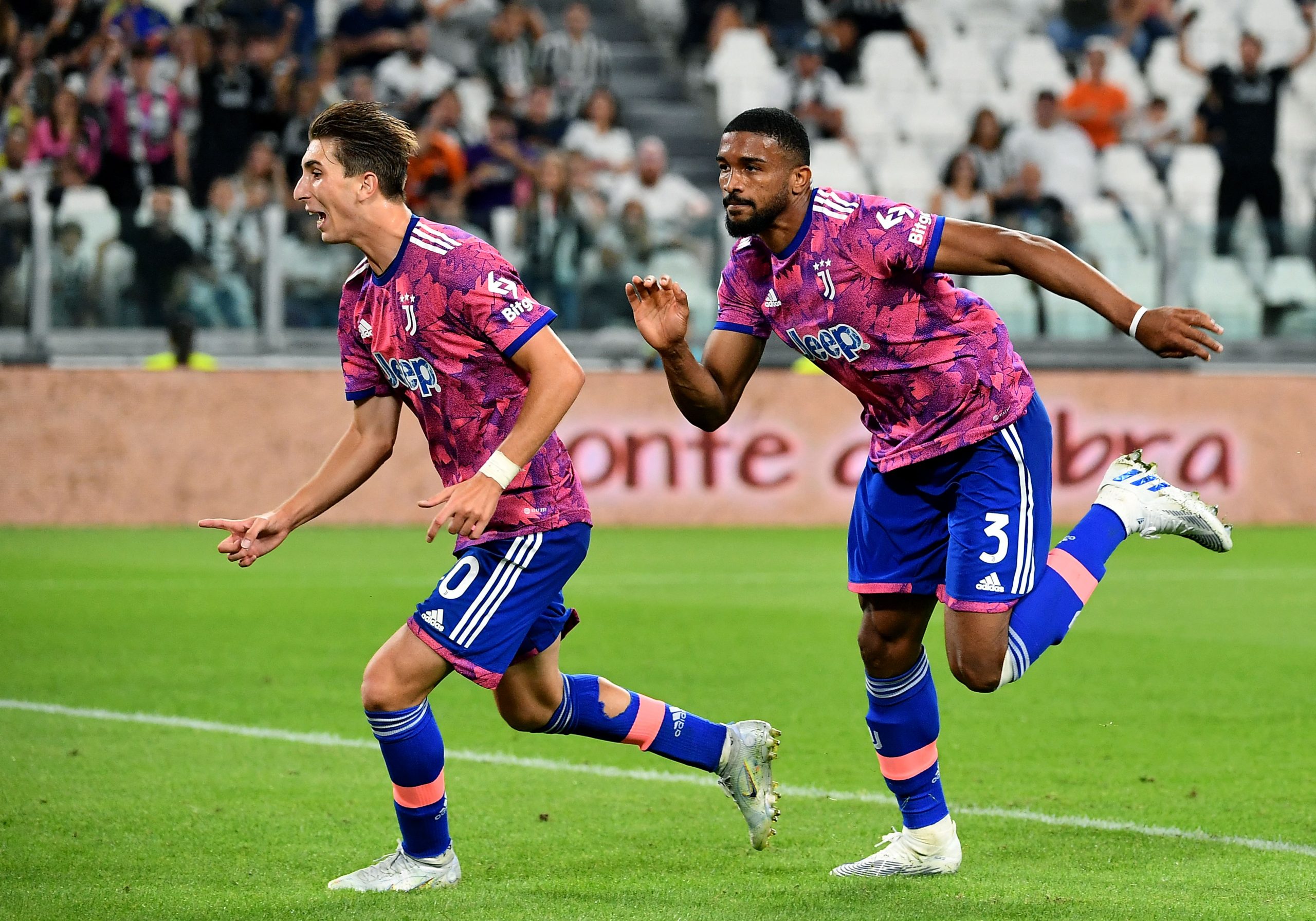 Juventus' Brazilian defender Bremer celebrates with Juventus' Italian midfielder Fabio Miretti (L) after scoring his team's first goal during the Italian Serie A football match between Juventus and Salernitana at the Juventus stadium in Turin on September 11, 2022. (Photo by Isabella BONOTTO / AFP) (Photo by ISABELLA BONOTTO/AFP via Getty Images)