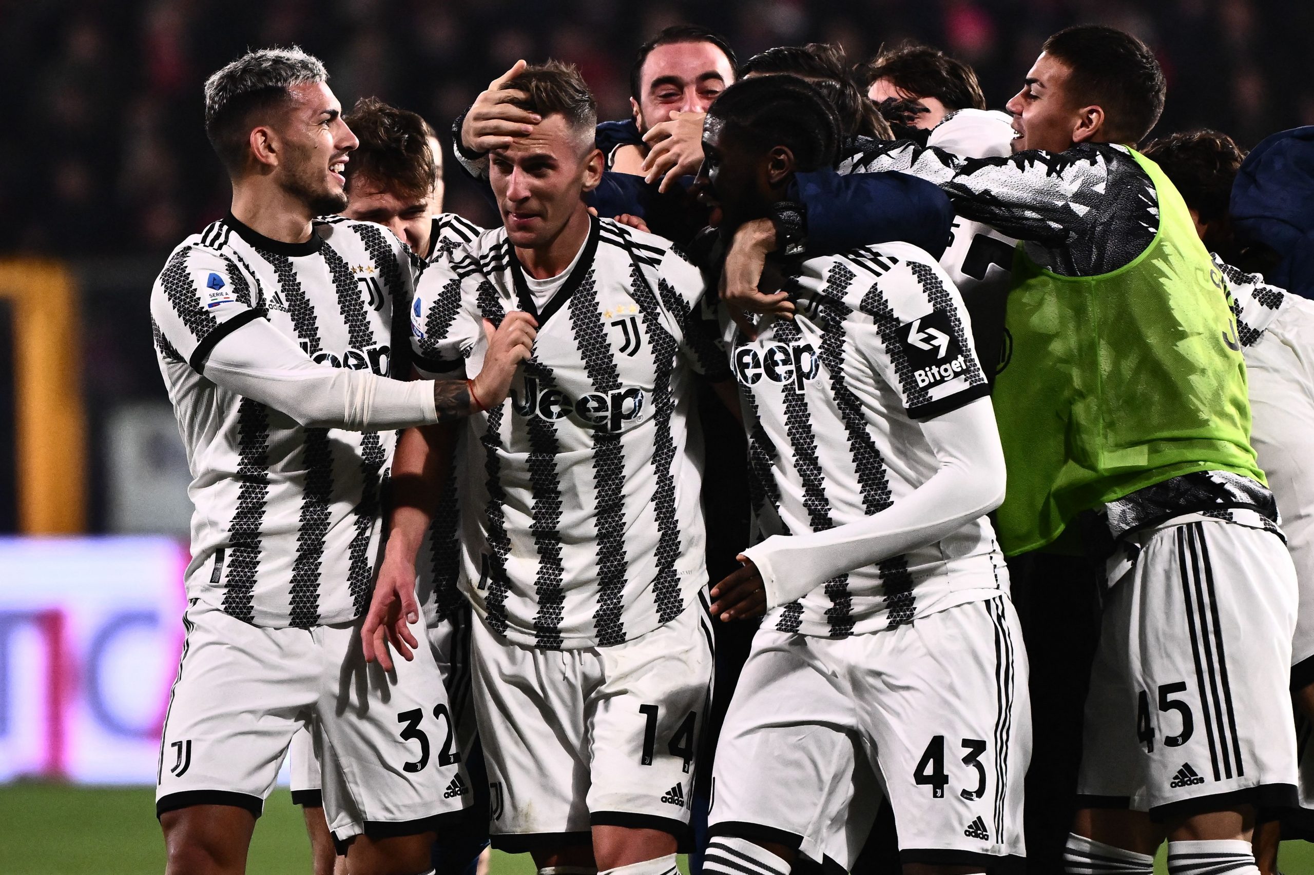 Juventus' Polish forward Arkadiusz Milik (2ndL) celebrates with teammates after opening the scoring during the Italian Serie A football match between Cremonese and Juventus on January 4, 2023 at the Giovanni-Zini stadium in Cremona. (Photo by Marco BERTORELLO / AFP) (Photo by MARCO BERTORELLO/AFP via Getty Images)