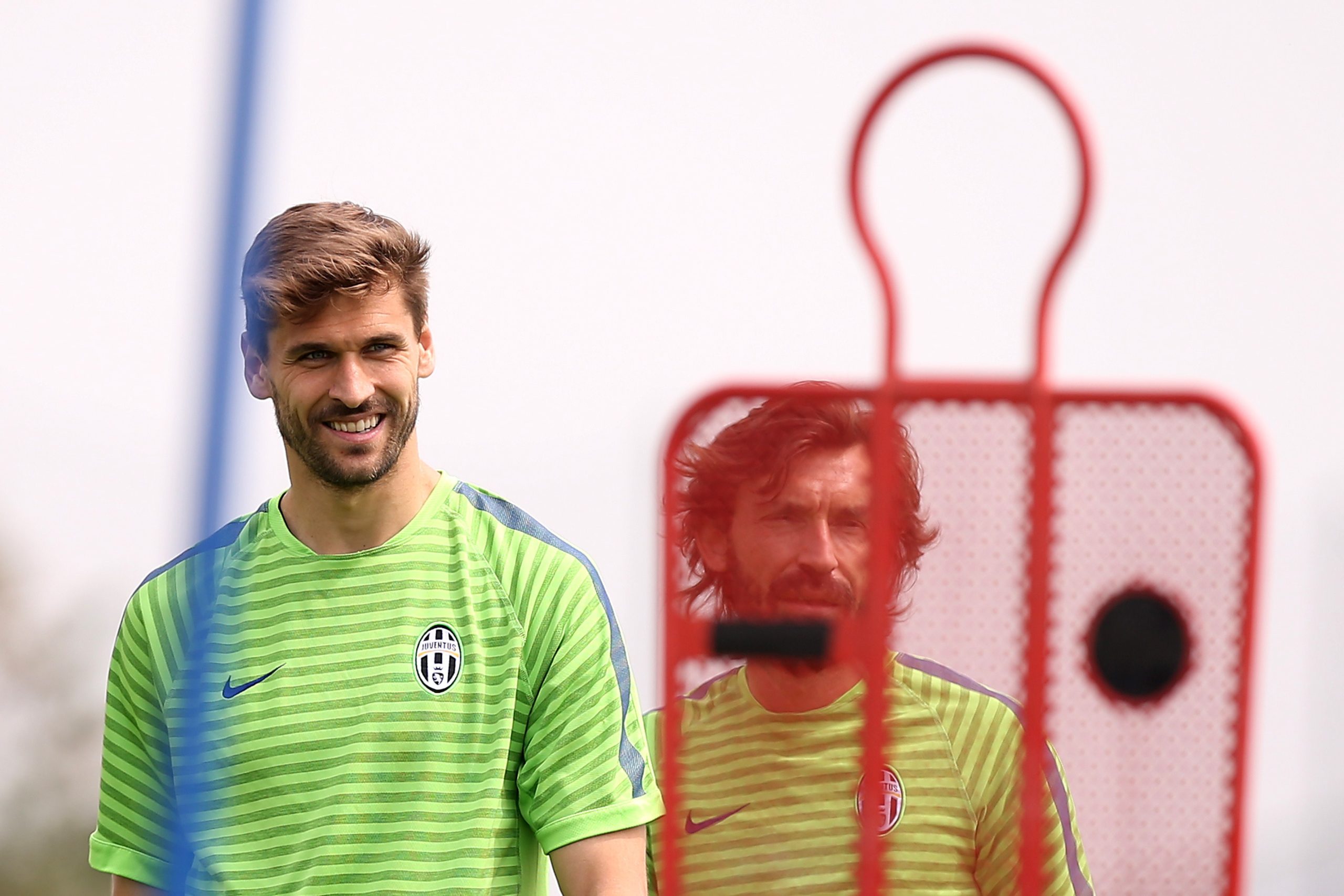 Juventus' Spanish forward Javier Fernando Torres Llorente (L) takes part in a training session on the eve of the UEFA Champions League semi-final second-leg football match Real Madrid Vs Juventus on May 12, 2015 at the "Juventus Training Center" in Vinovo, near Turin. AFP PHOTO / MARCO BERTORELLO (Photo credit should read MARCO BERTORELLO/AFP via Getty Images)