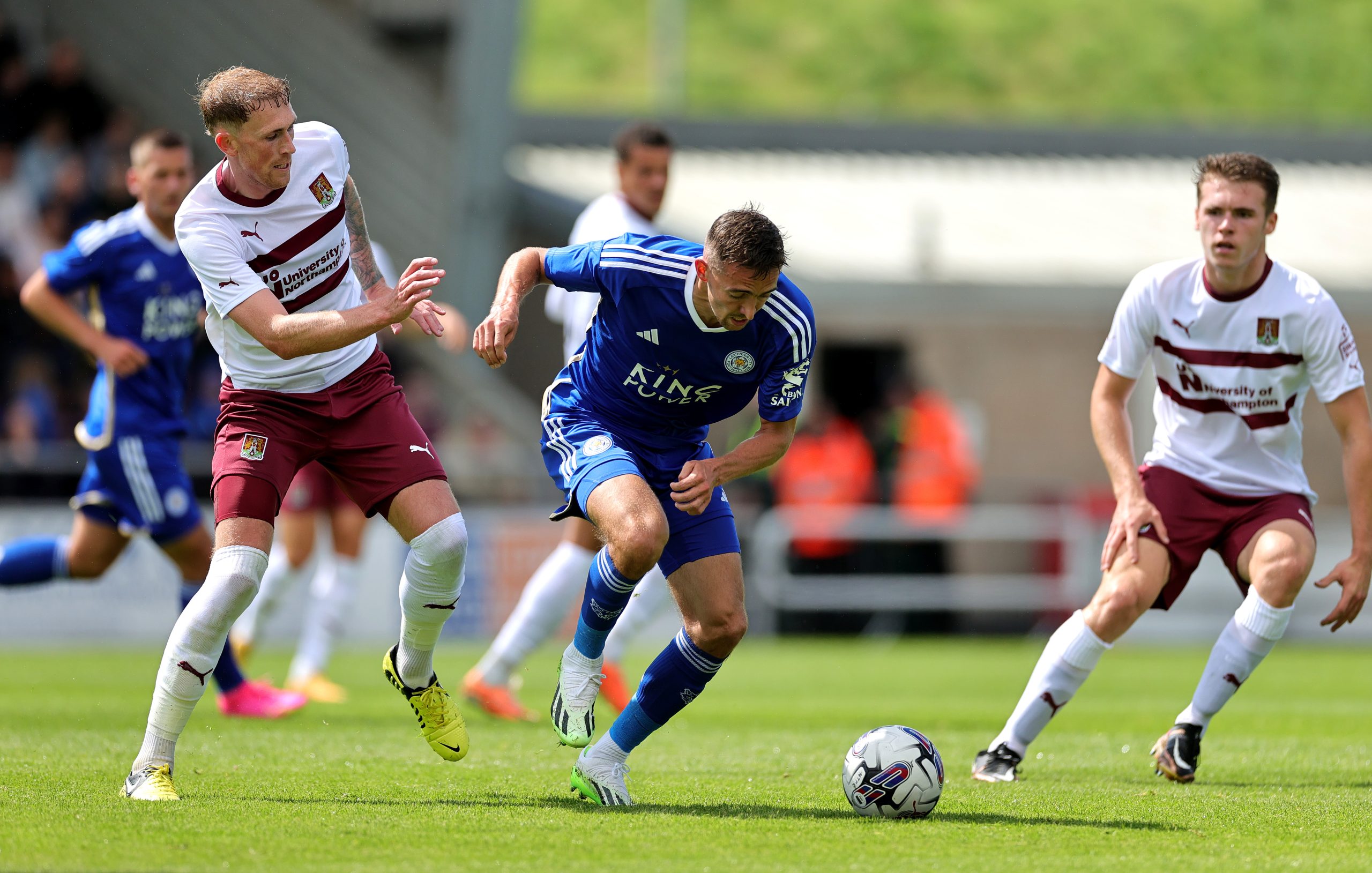 NORTHAMPTON, ENGLAND - JULY 15: Timothy Castagne of Leicester City moves away with the ball during the pre season friendly match between Northampton Town and Leicester City at Sixfields on July 15, 2023 in Northampton, England. (Photo by David Rogers/Getty Images)