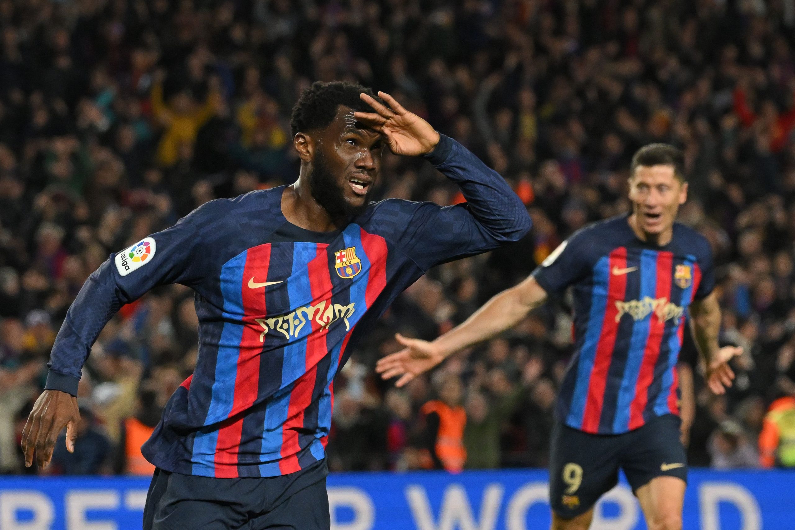 TOPSHOT - Barcelona's Ivorian midfielder Franck Kessie celebrates after scoring his team's second goal during the Spanish league football match between FC Barcelona and Real Madrid CF at the Camp Nou stadium in Barcelona on March 19, 2023. (Photo by LLUIS GENE / AFP) (Photo by LLUIS GENE/AFP via Getty Images)