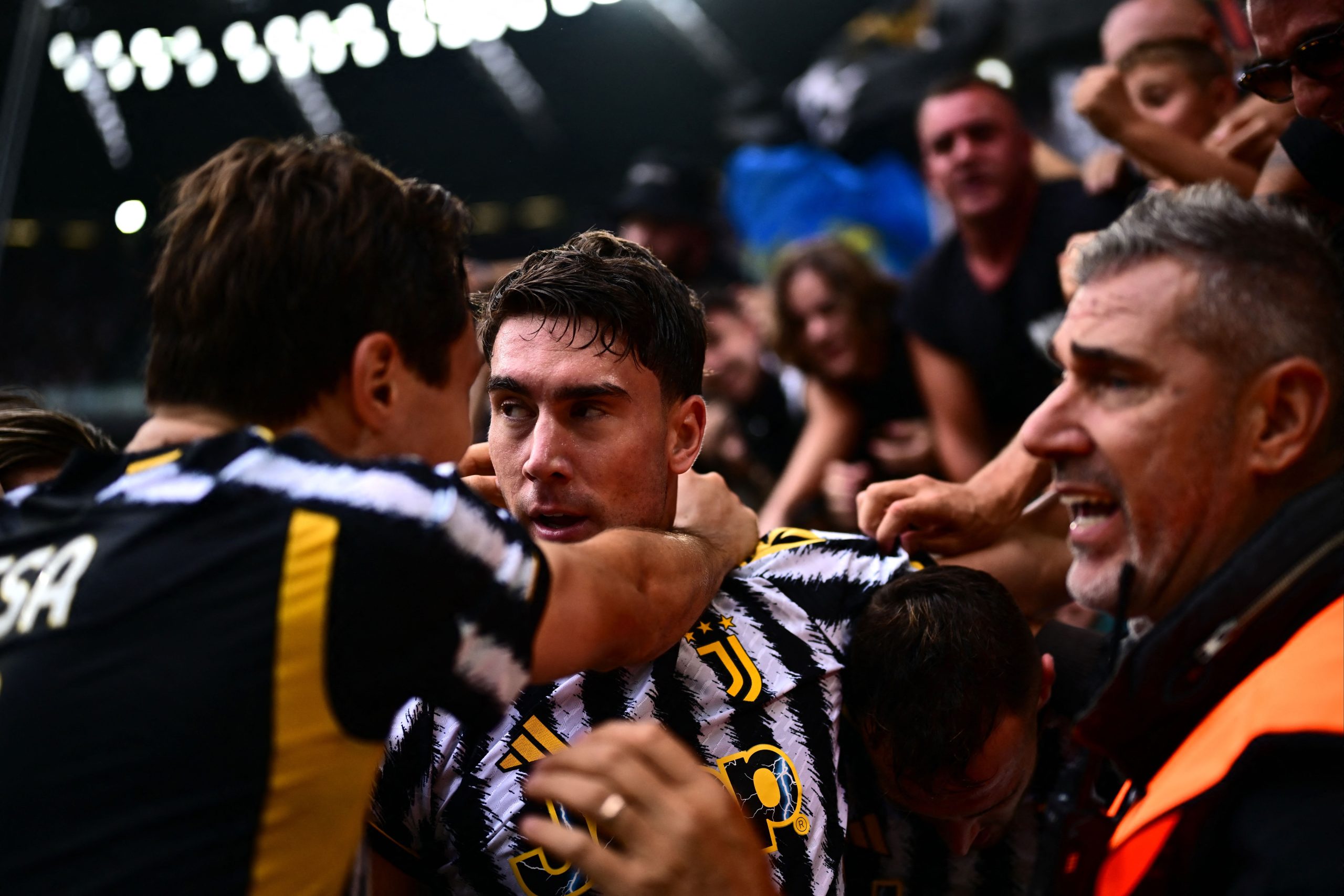 Juventus' Serbian forward #09 Dusan Vlahovic (C) celebrates after scoring his team's third goal during the Italian Serie A football match between Juventus and Lazio at the "Allianz Stadium" in Turin, on September 16, 2023. (Photo by MARCO BERTORELLO / AFP) (Photo by MARCO BERTORELLO/AFP via Getty Images)