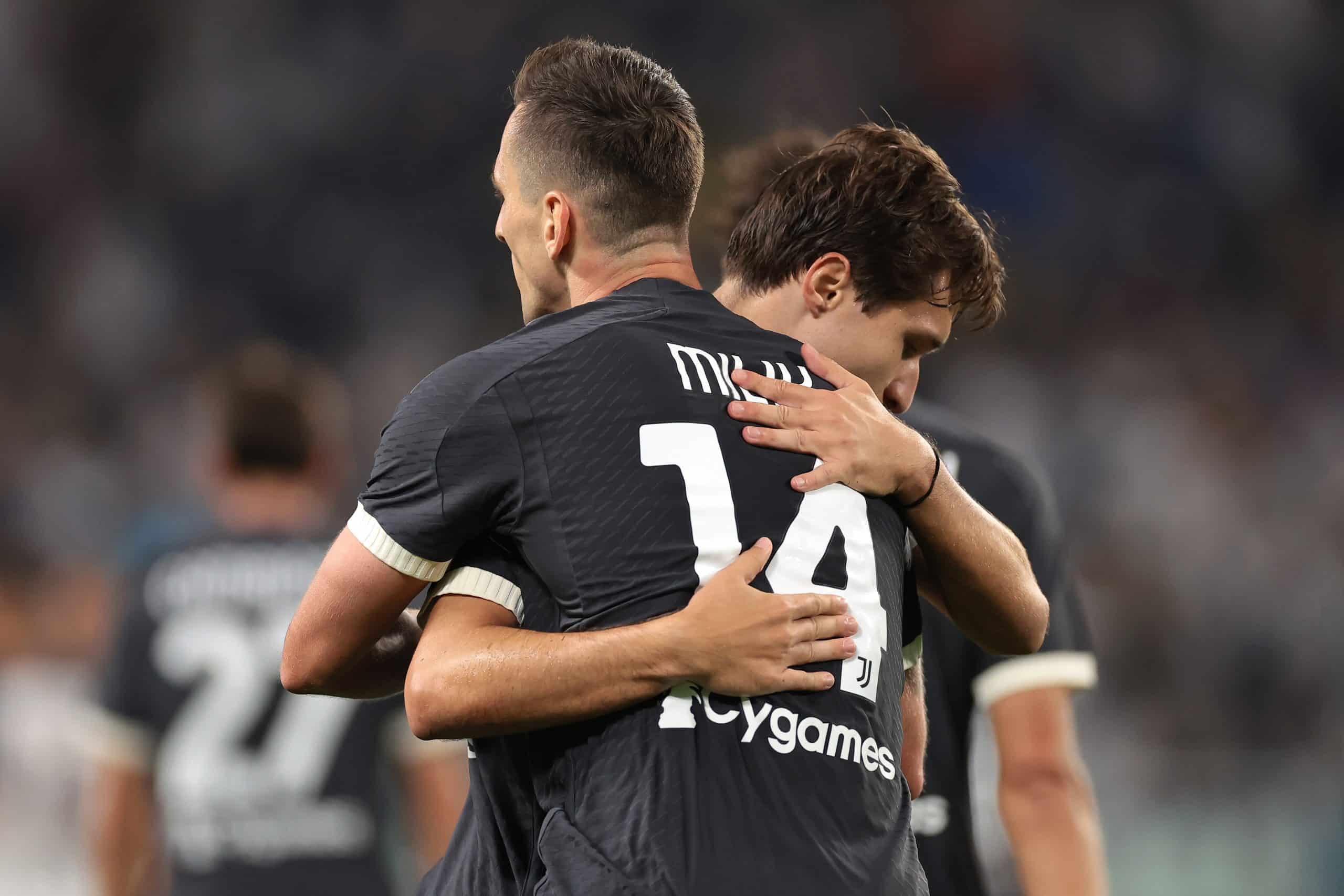 TURIN, ITALY - SEPTEMBER 26: Arkadiusz Milik of Juventus is embraced by team mate Federico Chiesa after scoring to give the side a 1-0 lead during the Serie A TIM match between Juventus and US Lecce at Allianz Stadium on September 26, 2023 in Turin, Italy. (Photo by Jonathan Moscrop/Getty Images)
