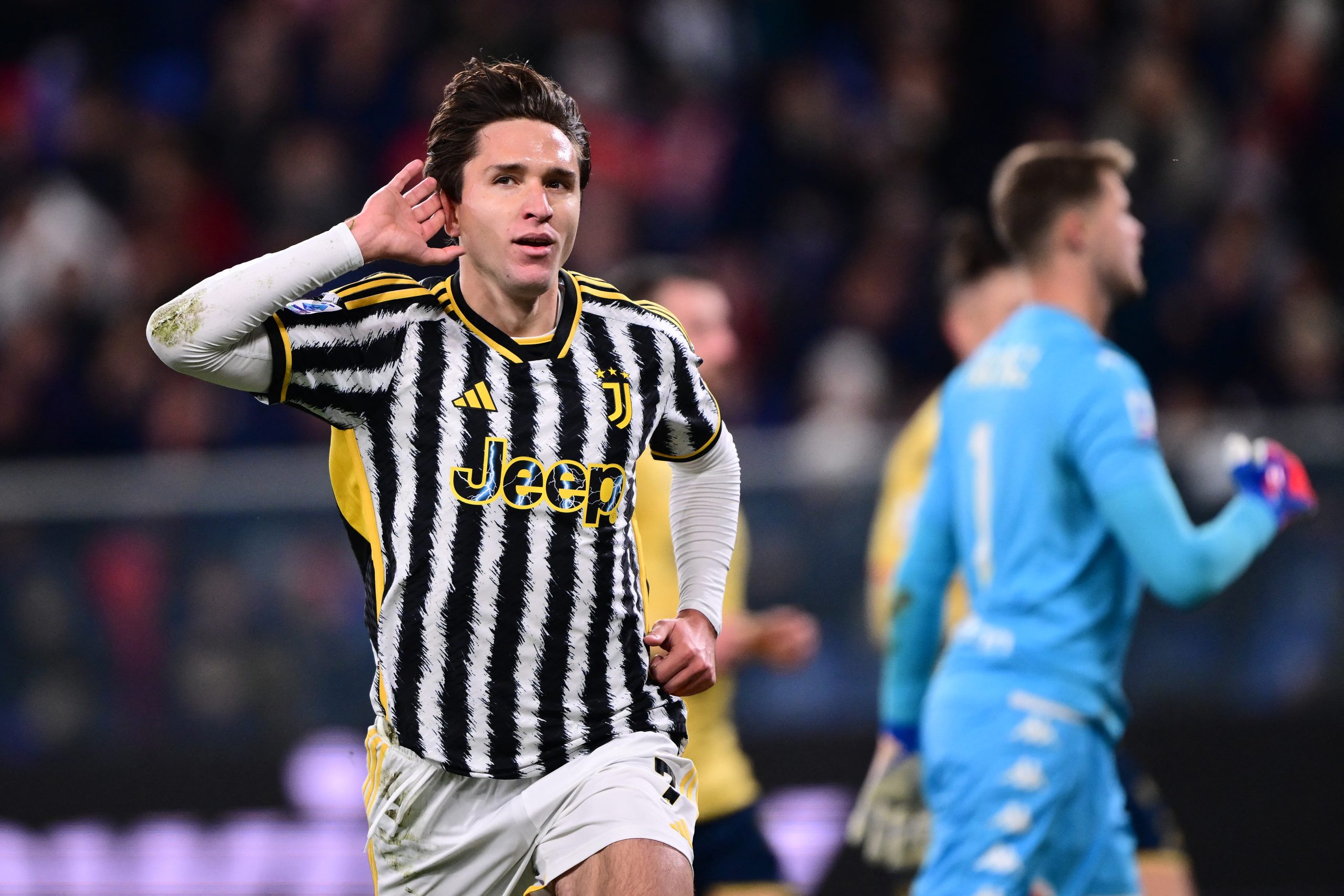 Juventus' Italian forward #07 Federico Chiesa celebrates after scoring a penalty during the Italian Serie A football match between Genoa and Juventus at the Luigi Ferraris stadium, on December 15, 2023. (Photo by Marco BERTORELLO / AFP) (Photo by MARCO BERTORELLO/AFP via Getty Images)