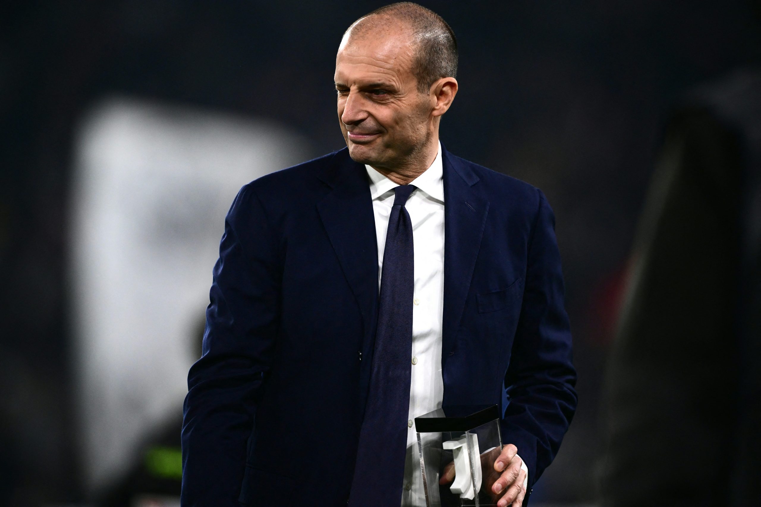 Juventus Italian coach Massimiliano Allegri receives the award for his 405th presence on the bench for Juventus before the Italian Serie A football match Juventus vs Udinese on February 12, 2024 at the "Allianz Stadium" in Turin. (Photo by MARCO BERTORELLO / AFP) (Photo by MARCO BERTORELLO/AFP via Getty Images)