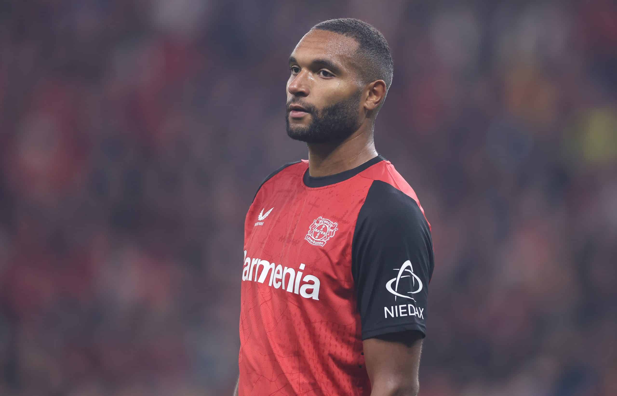 LEVERKUSEN, GERMANY - OCTOBER 01: Jonathan Tah of Bayer Leverkusen looks on during the UEFA Champions League 2024/25 League Phase MD2 match between Bayer 04 Leverkusen and AC Milan at BayArena on October 01, 2024 in Leverkusen, Germany. (Photo by Lars Baron/Getty Images)