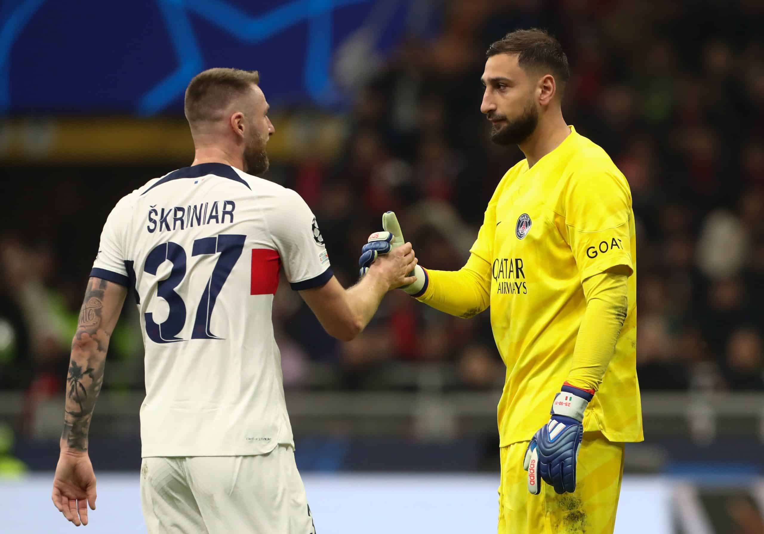 MILAN, ITALY - NOVEMBER 07: Milan Skriniar and Gianluigi Donnarumma of Paris Saint-Germain interact during the UEFA Champions League match between AC Milan and Paris Saint-Germain at Stadio Giuseppe Meazza on November 07, 2023 in Milan, Italy. (Photo by Marco Luzzani/Getty Images)