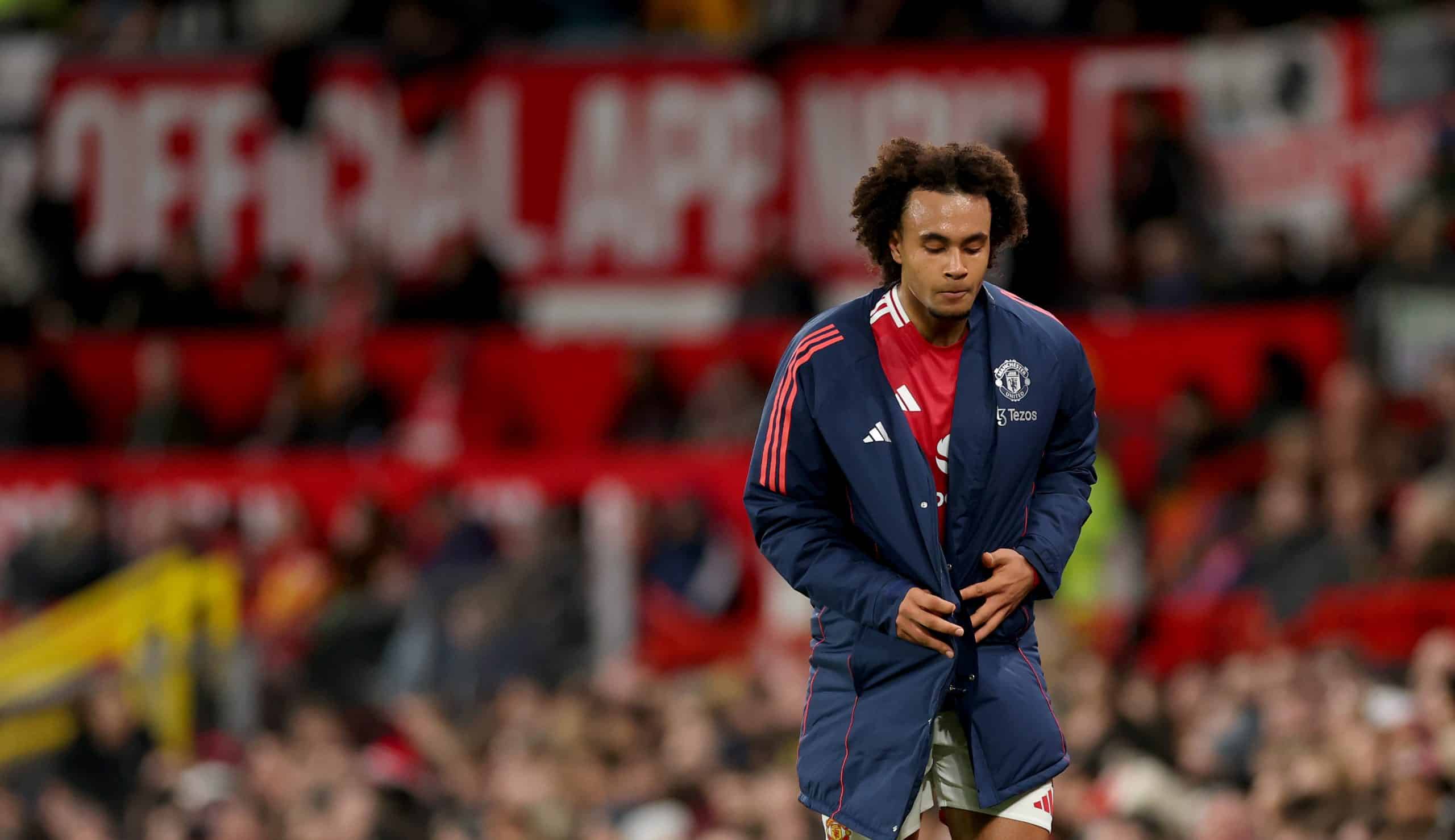 MANCHESTER, ENGLAND - DECEMBER 30: Joshua Zirkzee of Manchester United is substituted and replaced by Kobbie Mainoo during the first half of the Premier League match between Manchester United FC and Newcastle United FC at Old Trafford on December 30, 2024 in Manchester, England. (Photo by Carl Recine/Getty Images)