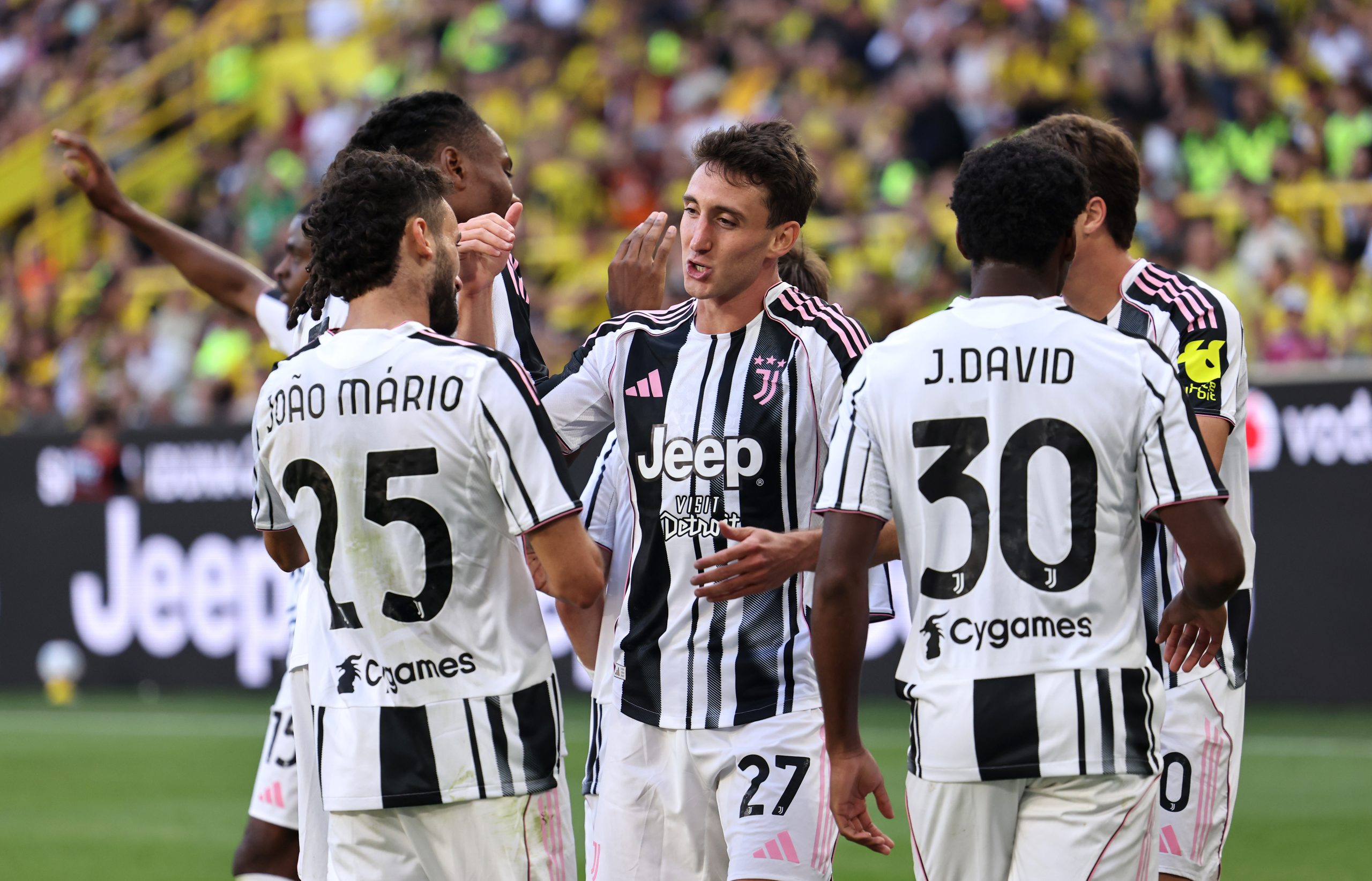 DORTMUND, GERMANY - AUGUST 10: Andrea Cambiaso of Juventus celebrates scoring his team's second goal with teammate Joao Mario during the pre-season friendly match between Borussia Dortmund and Juventus FC at Signal Iduna Park on August 10, 2025 in Dortmund, Germany. (Photo by Christof Koepsel/Getty Images)