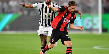 Nico Gonzalez aux prises avec Luka Modric lors de Juventus - Milan (Photo by Valerio Pennicino/Getty Images)